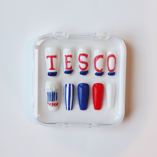 Set of fake nails in a clear case with Tesco branding on a white background